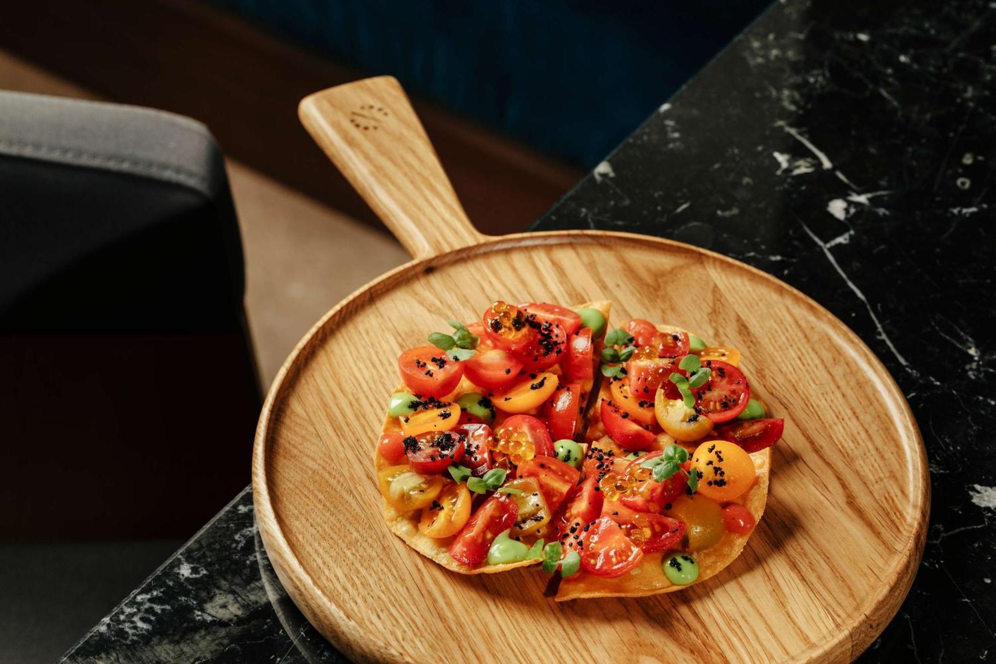 塞维利亚马格达莱纳广场丽笙精选酒店 外观 照片 A pizza at the restaurant