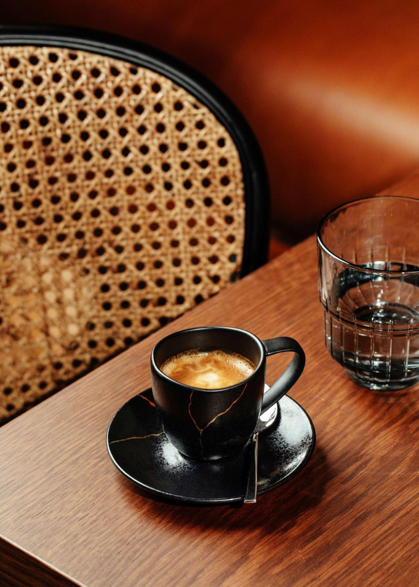 塞维利亚马格达莱纳广场丽笙精选酒店 外观 照片 A cup of espresso